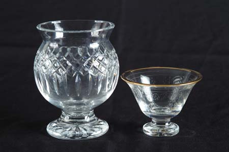 Appraisal: TWO WATERFORD CLEAR GLASS PIECES - bulbous footed vase has