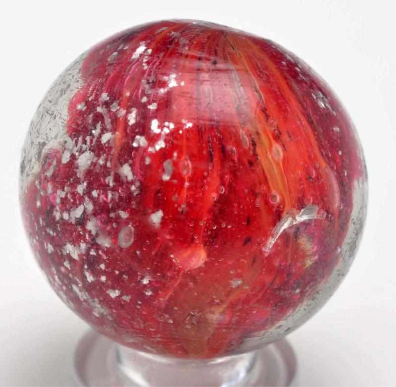 Appraisal: Shrunken Core Onionskin Marble with Floating Mica Description Red and