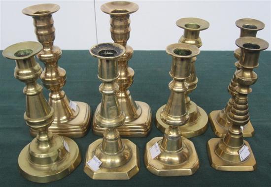 Appraisal: FOUR PAIRS ENGLISH TH C BRASS CANDLESTICKS