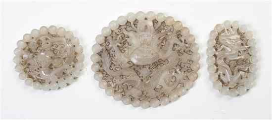 Appraisal: Three Carved Jade Medallions each of light near-white stone having