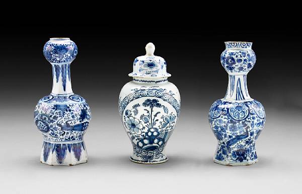 Appraisal: A group of three blue and white earthenware vases th