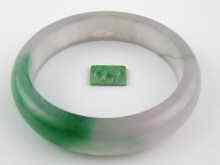 Appraisal: A jade bangle approx cm diameter together with a jade