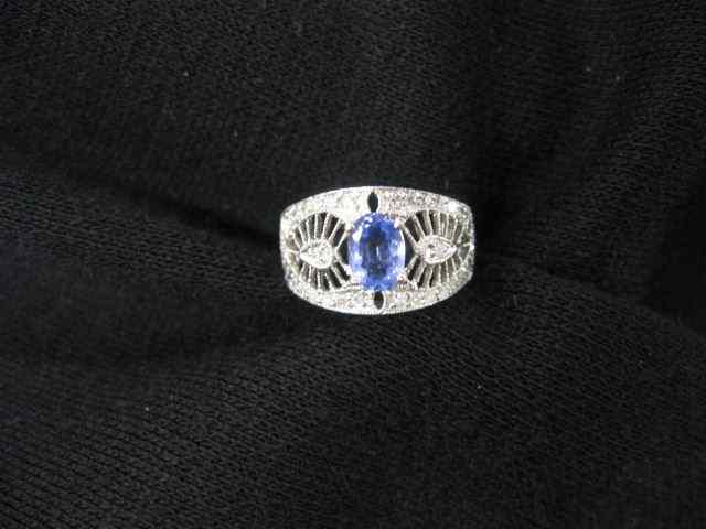 Appraisal: Tanzanite Diamond Ring oval gem weighing carat surrounded by diamonds