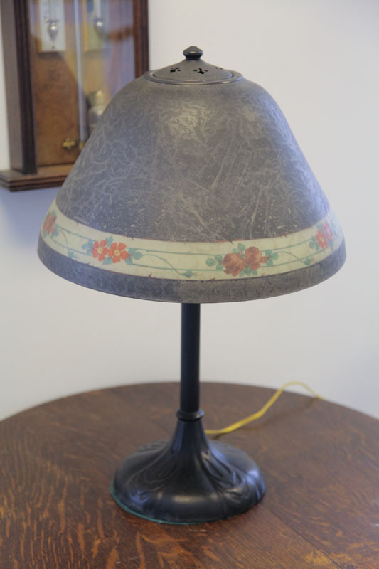 Appraisal: HANDEL TABLE LAMP Round leaf molded base reeded column and