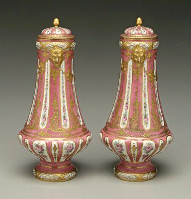 Appraisal: Pair S egrave vres style lidded urns Louis XVI style