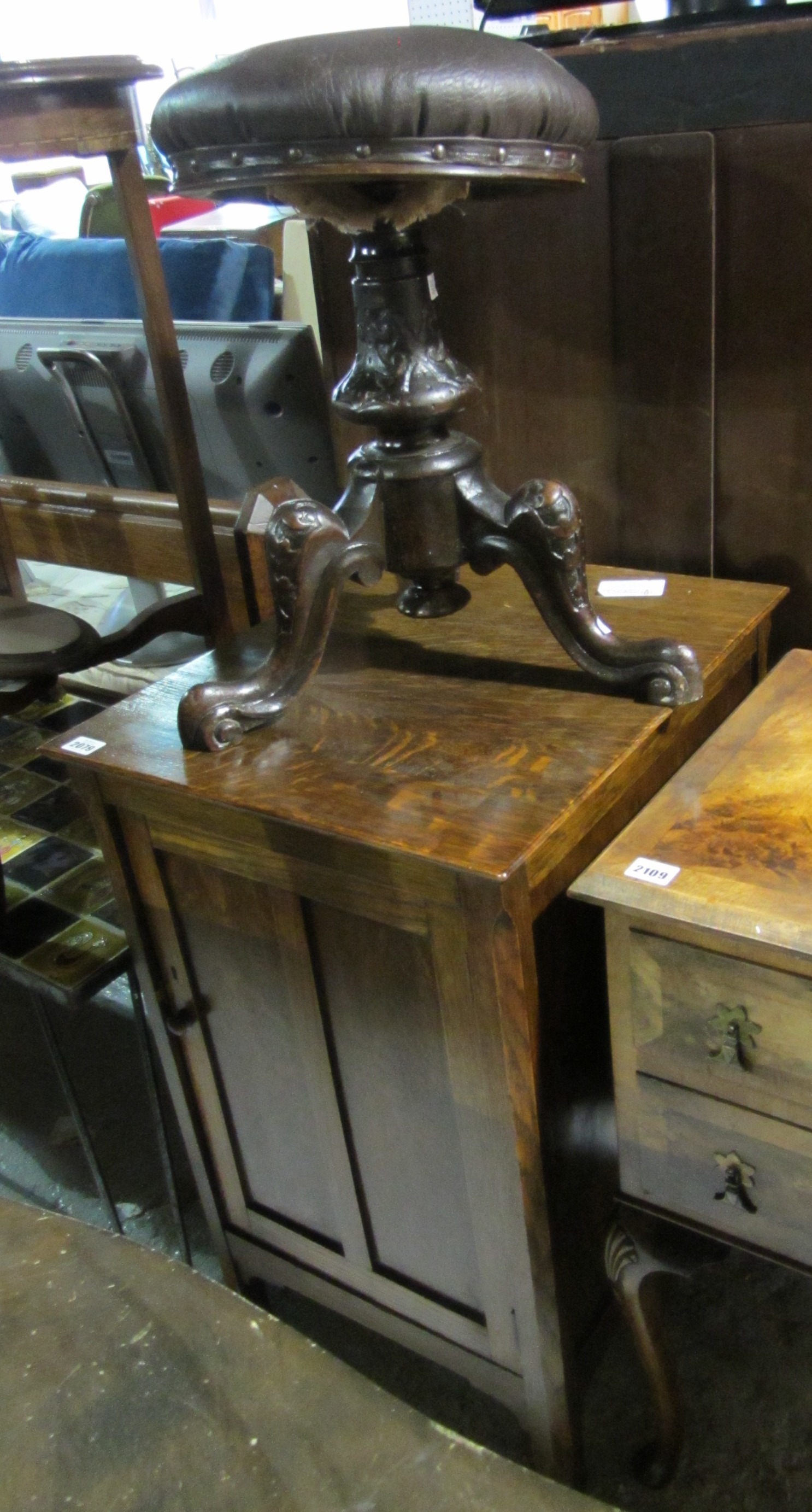 Appraisal: A th century oak pot cupboard and a mahogany circular