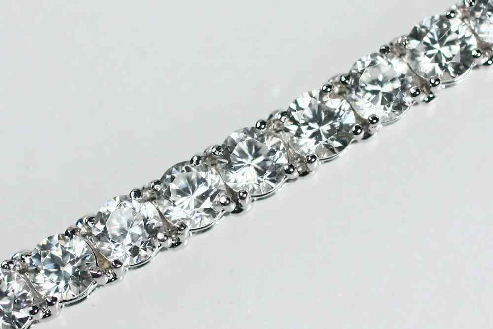 Appraisal: BRACELET - One K white gold and white topaz bracelet