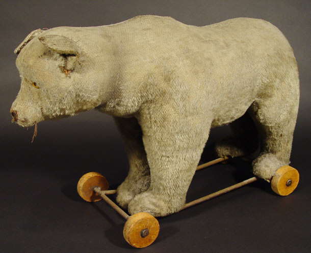 Appraisal: Edwardian straw filled child's ride-on bear with voicebox cm high