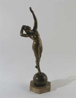 Appraisal: An Art Nouveau bronze figure of a dancer balancing on