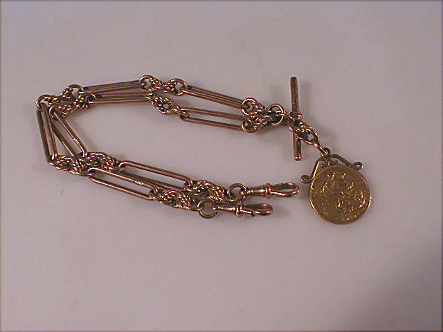 Appraisal: A large link ct gold watch chain with swivels T-bar