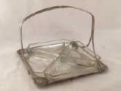 Appraisal: A square silver plated hors d'oeuvre dish with four cut