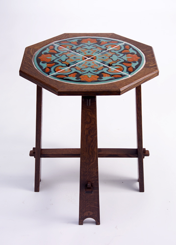 Appraisal: CALIFORNIA Tile-top table with a four quadrant Hispano-Moresque medallion set