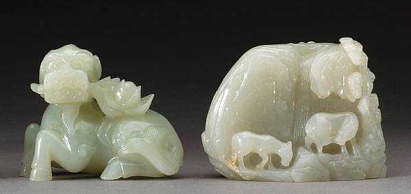 Appraisal: Two jade carvings The first carved from a grayish-white matrix