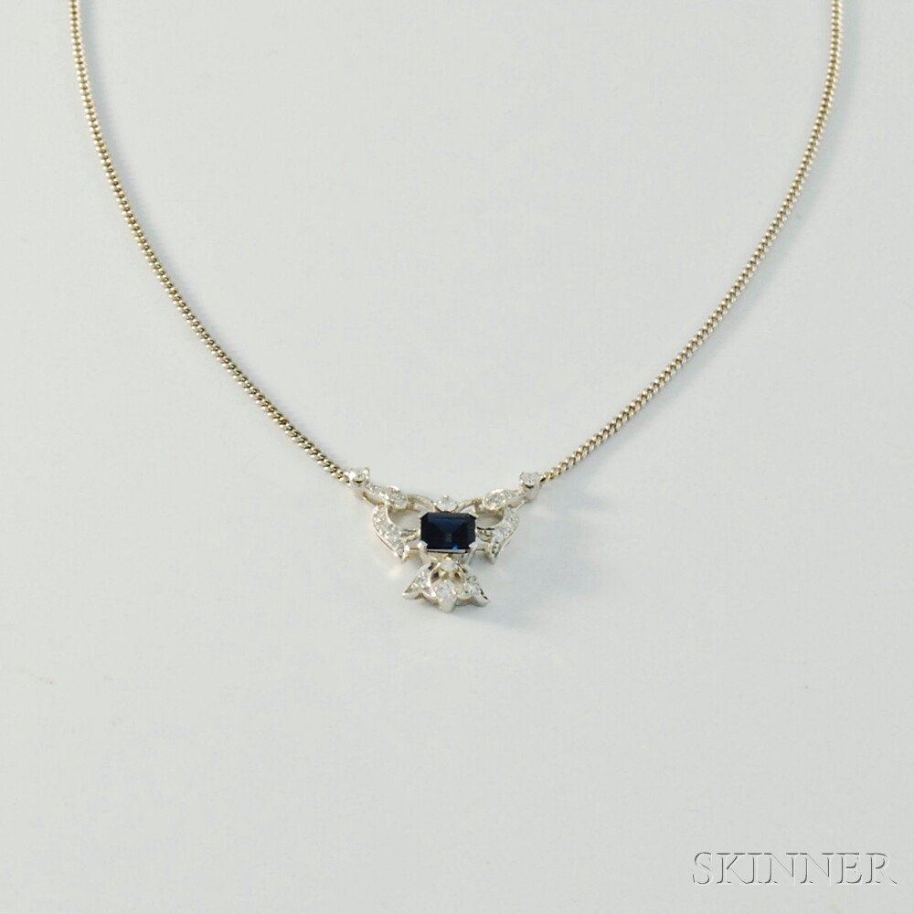 Appraisal: kt White Gold Diamond and Sapphire Pendant Necklace the scrolling