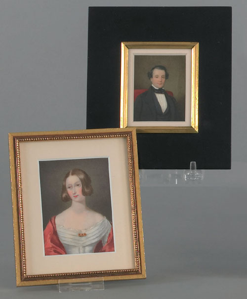 Appraisal: Two watercolor on ivory miniature portraits of a man and