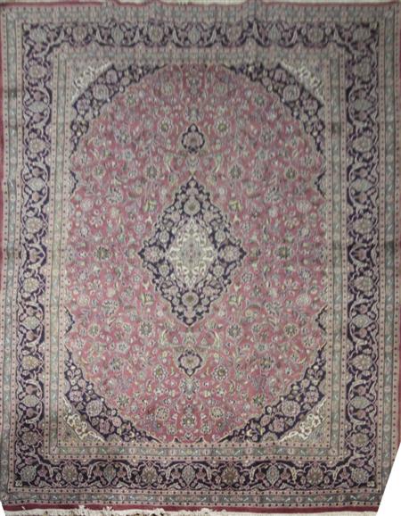 Appraisal: A Kashan carpet modern the red field with central ivory