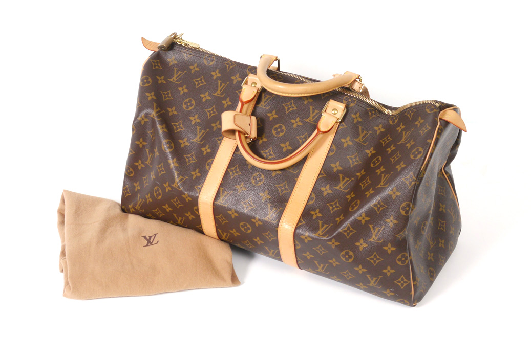 Appraisal: LOUIS VUITTON KEEPALL BAG Size Purchased at Saks Vuitton Boutique