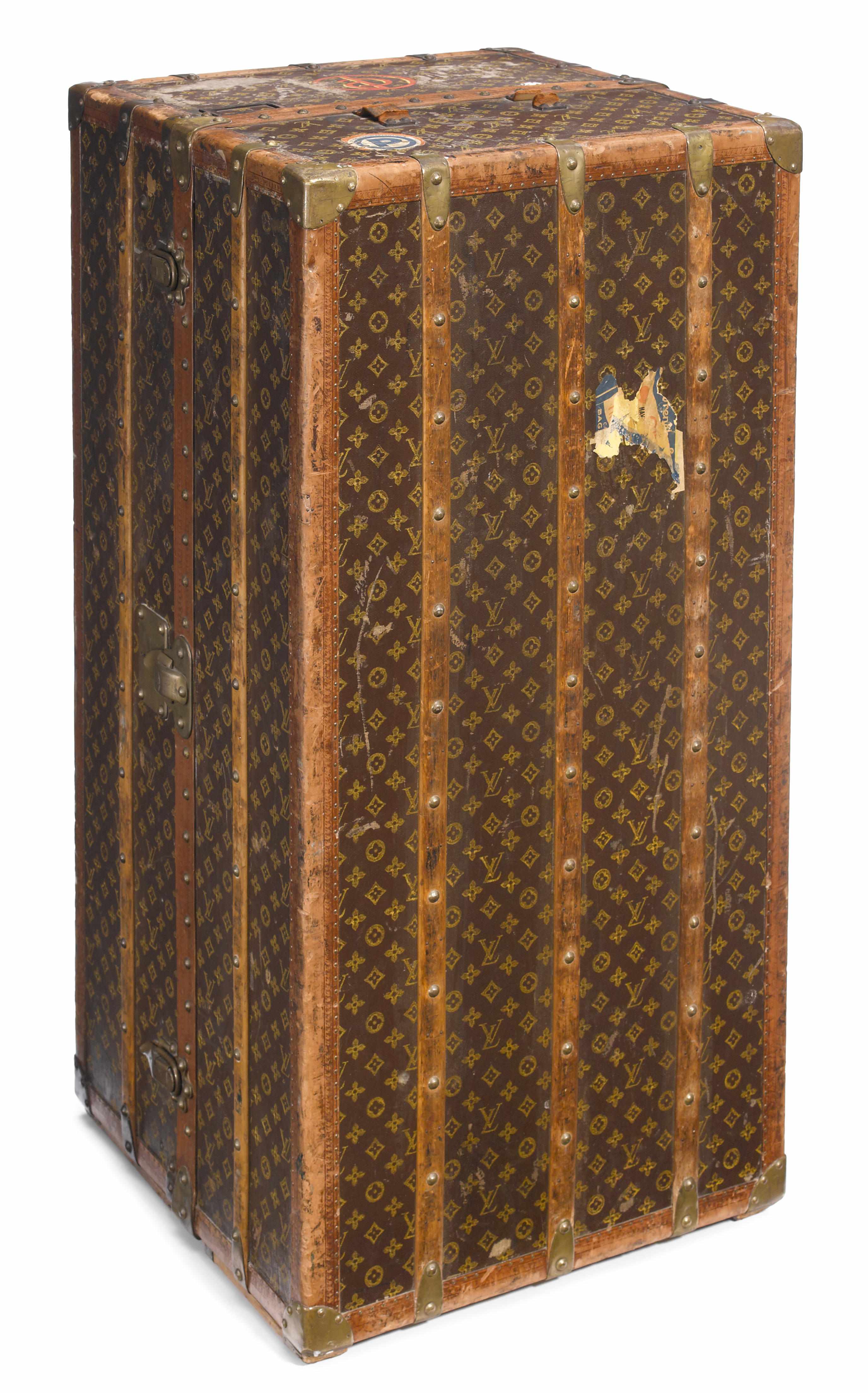 Appraisal: A Louis Vuitton printed canvas enameled metal and wood wardrobe