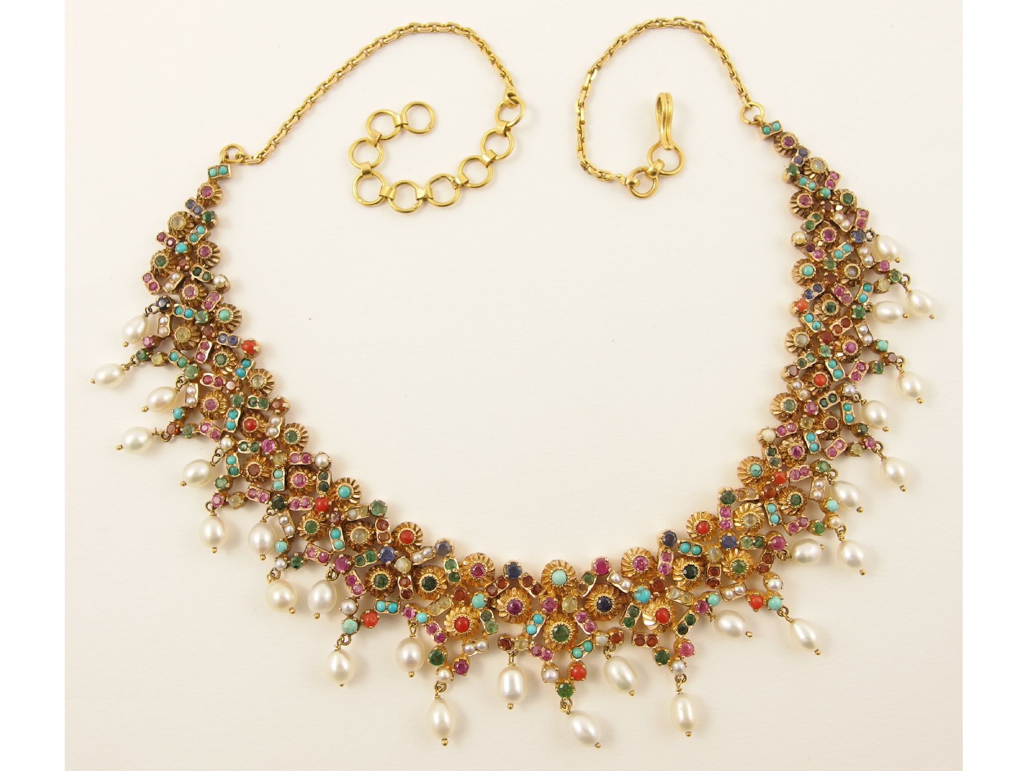 Appraisal: An Indian necklacein bright yellow metal set with a rainbow