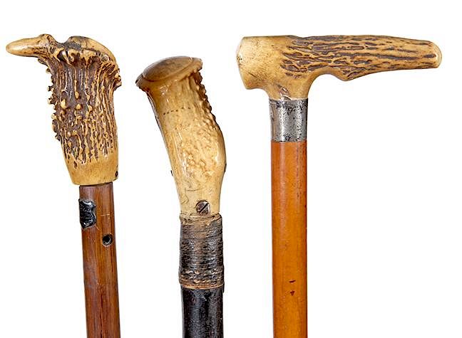 Appraisal: Stag Canes th Century- Group of three early stag handles