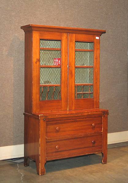 Appraisal: An American provincial pine secretary bookcase th century height ft