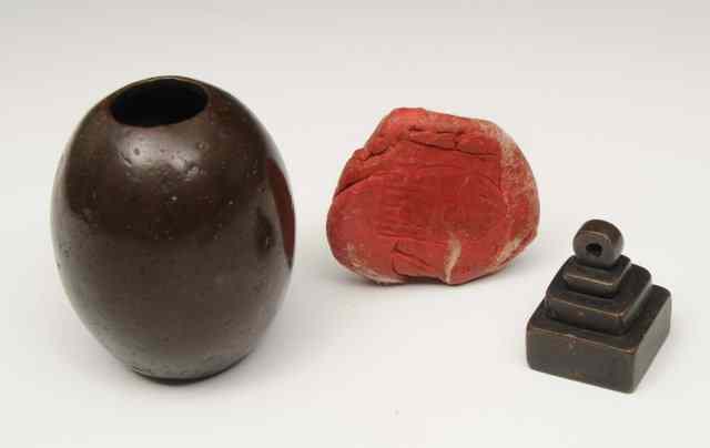 Appraisal: A CHINESE BRONZE SEAL possibly Han dynasty and an ovoid