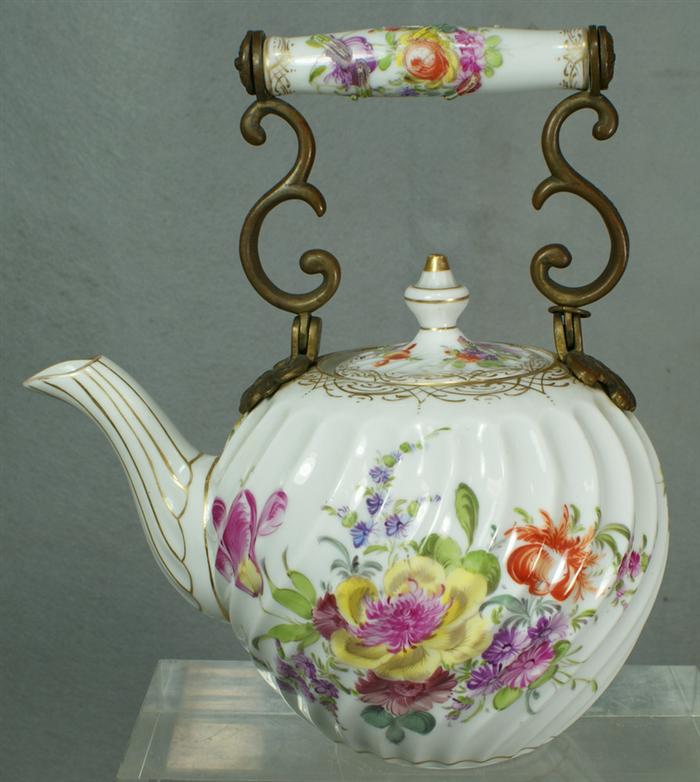 Appraisal: Dresden teapot with a bronze mounted porcelain handle old staple