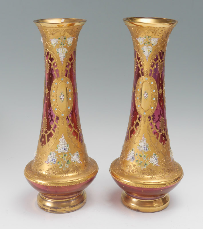 Appraisal: PAIR CRANBERRY GLASS VASES attrib MOSER Parcel gilt with applied