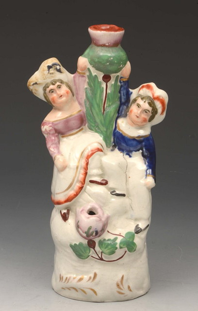 Appraisal: A STAFFORDSHIRE POTTERY SPILL HOLDER cm high