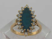 Appraisal: A carat yellow gold emerald and diamond ring the central