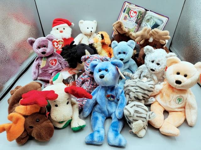 Appraisal: Group of plush includes several Ty Beanie Babies Signature Bear