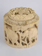 Appraisal: An ivory box circa the thick walls with elephants and