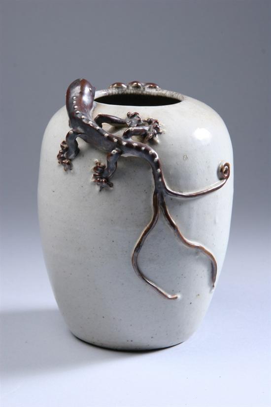 Appraisal: CHINESE BEIGE AND CHOCOLATE PORCELAIN VASE th century Of ovoid