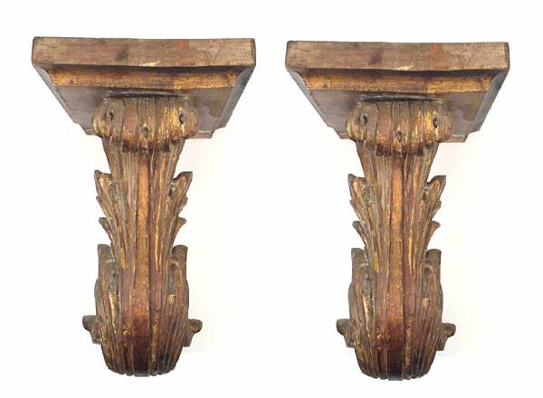 Appraisal: A pair of Rococo style carved giltwood wall brackets height