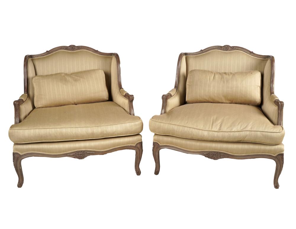 Appraisal: PAIR OF LOUIS XV-STYLE BERGERES th century covered with beige