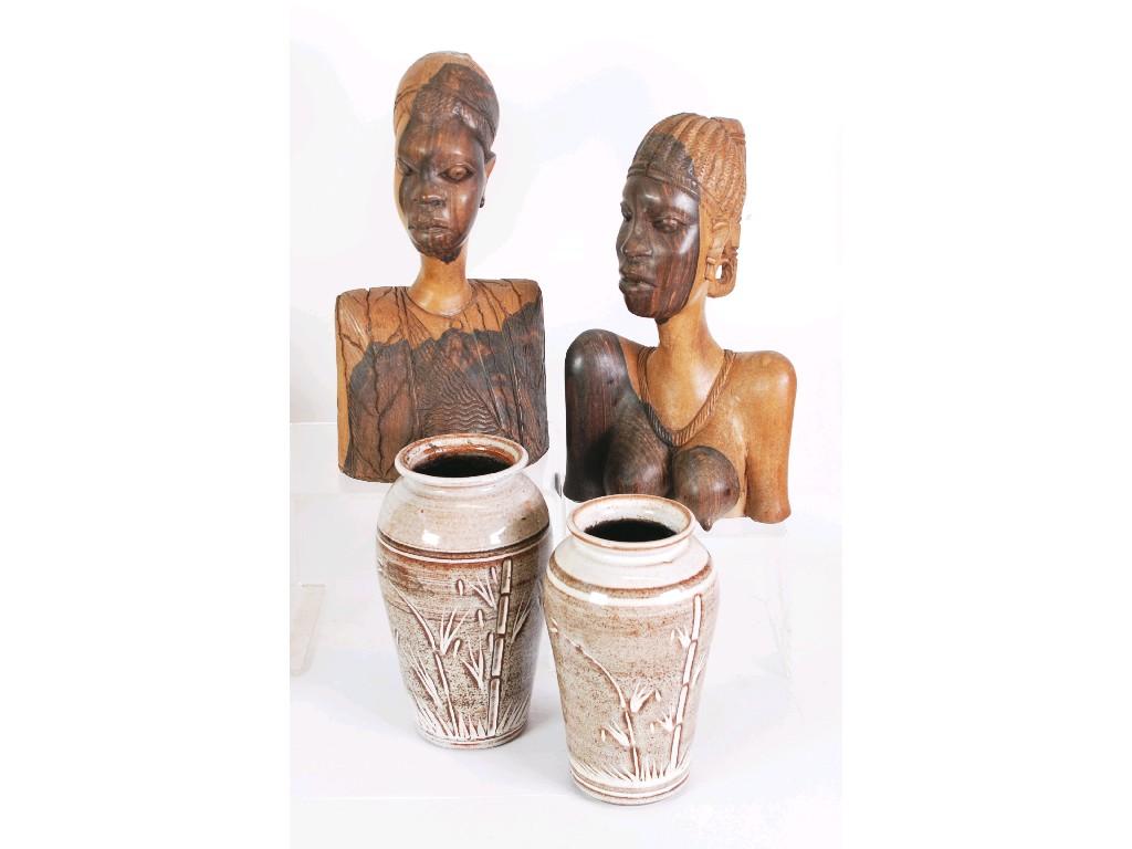 Appraisal: TWO AFRICAN CARVED WOODEN BUSTS of a native male and