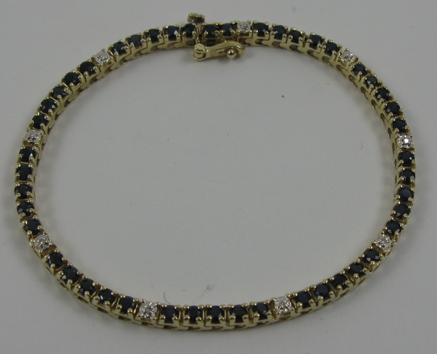 Appraisal: SAPPHIRE DIAMOND AND FOURTEEN KARAT GOLD BRACELET - in length