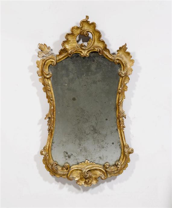 Appraisal: A CARTOUCHE-SHAPED MIRROR Rococo Venice th c Carved painted and