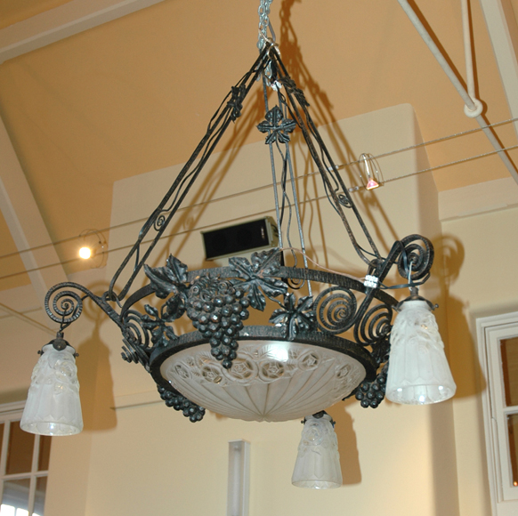 Appraisal: A DEGUE ART DECO WROUGHT IRON AND GLASS CEILING LIGHT