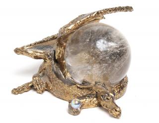 Appraisal: Gilt Metal Dragon Crystal Ball Paperweight The reclining dragon clutching