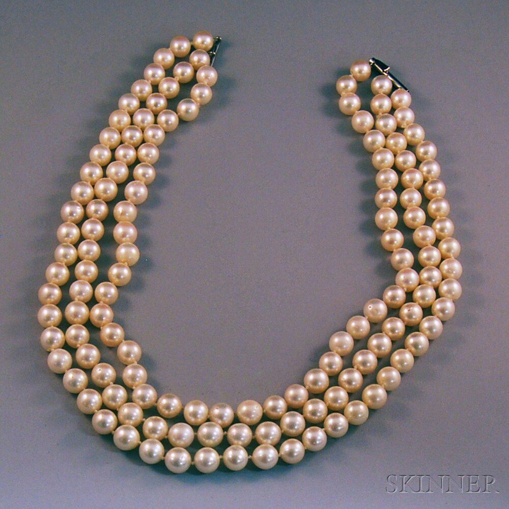 Appraisal: Triple-strand Cultured Pearl Necklace completed with white gold and diamond