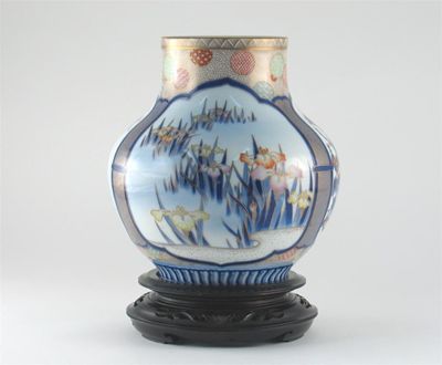 Appraisal: A Japanese Fukugawa Imari ovoid vase decorated with three panels