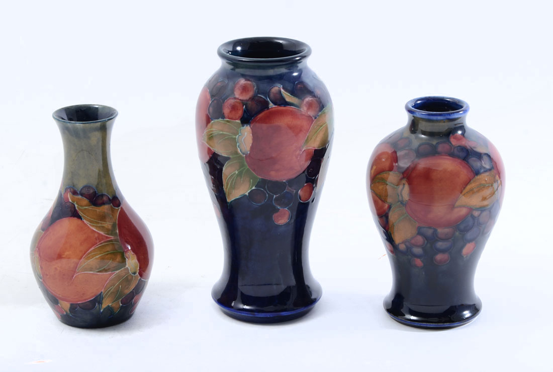 Appraisal: MOORCROFT POTTERY POMEGRANATE VASES pieces total to include Small mottled