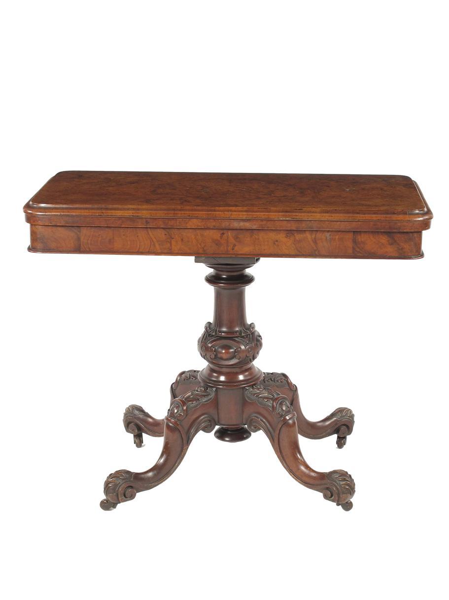 Appraisal: A Victorian walnut card table