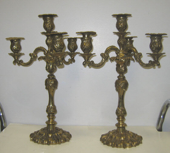 Appraisal: PAIR OF FOUR LIGHT GILT METAL CANDELABRA Decorated with scrolling