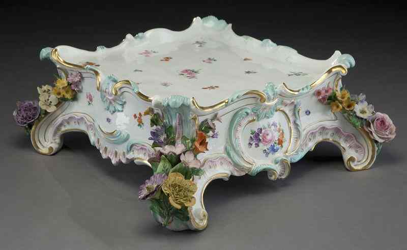 Appraisal: Meissen porcelain plateauwith gilt details raised on rocaille feet with