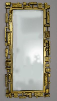 Appraisal: A Syroco America gilt frame mirror rectangular form cast with