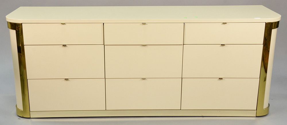 Appraisal: John Stewart nine-drawer commode mid-century design graduated drawers with brass