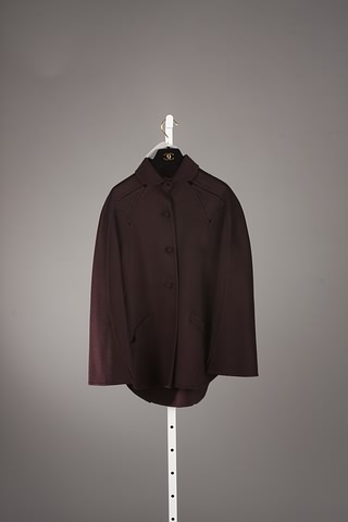 Appraisal: CHADO Burgundy cashmere swing jacket with front knot buttons and