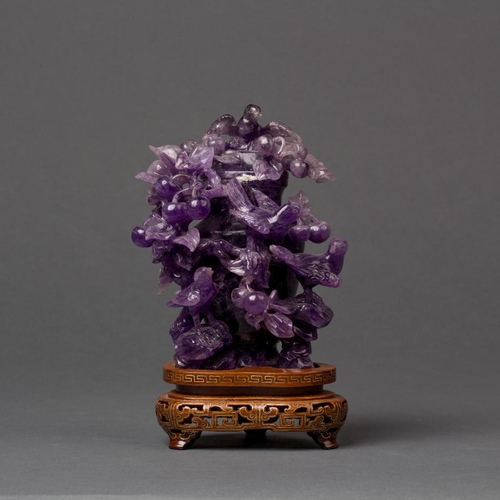 Appraisal: A CARVED AMETHYST SNUFF BOTTLE WITH BIRDS Carved amethyst jar